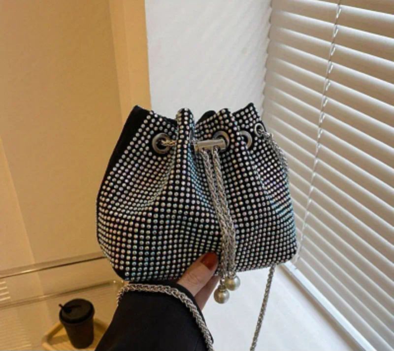 Skinnende håndveske